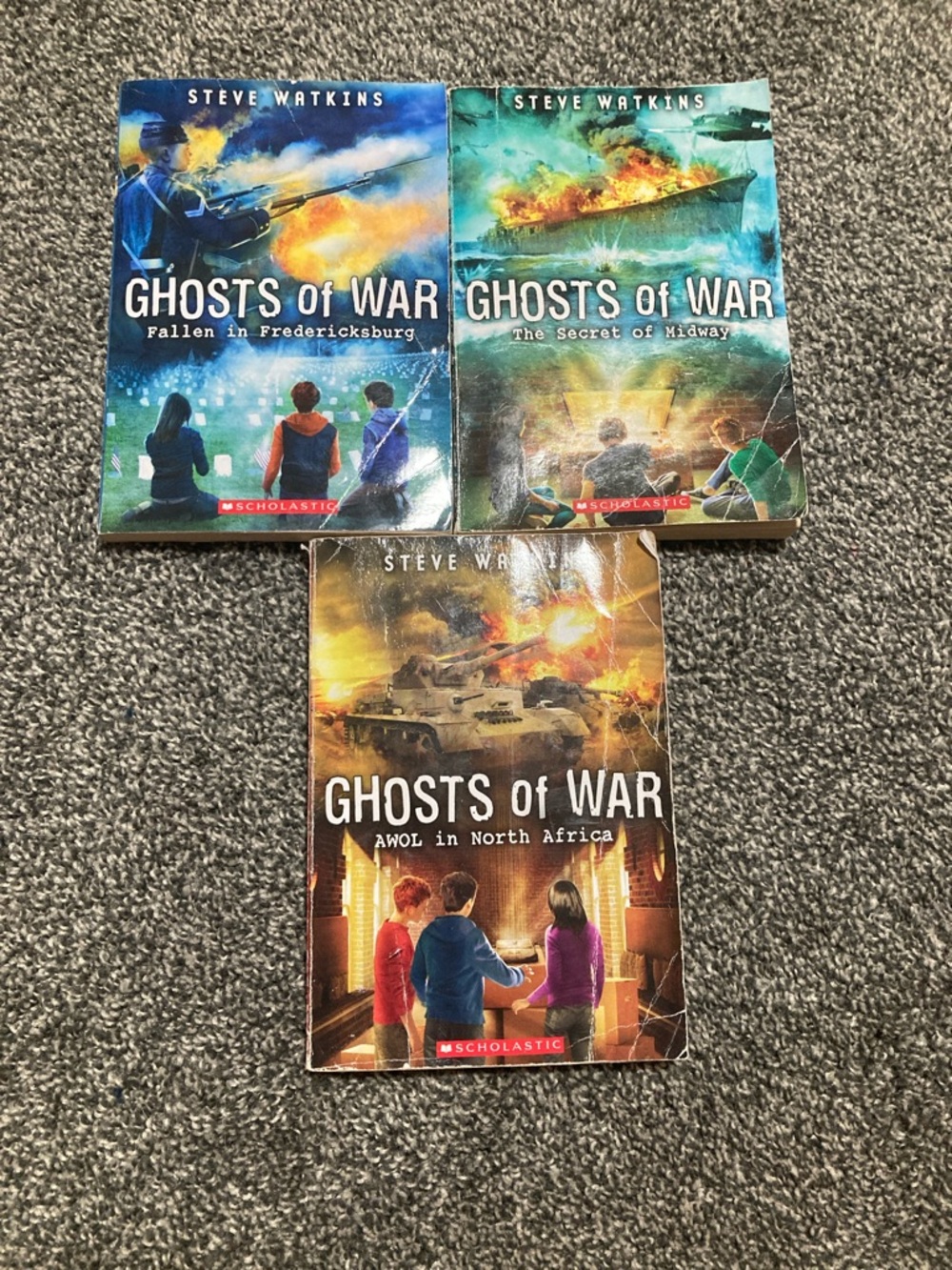 Scholastic Ghosts of War set - blue, teal, orange, brown covers